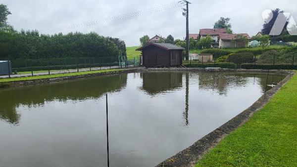 Maison individuelle occupée avec étang