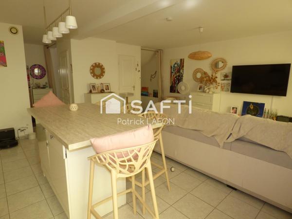 Bel appartement en duplex 2 terrasses et parking.