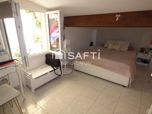 Bel appartement en duplex 2 terrasses et parking.