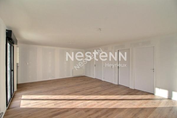 Centre village- Appartement 2 chambres- Balcon- Stationnement