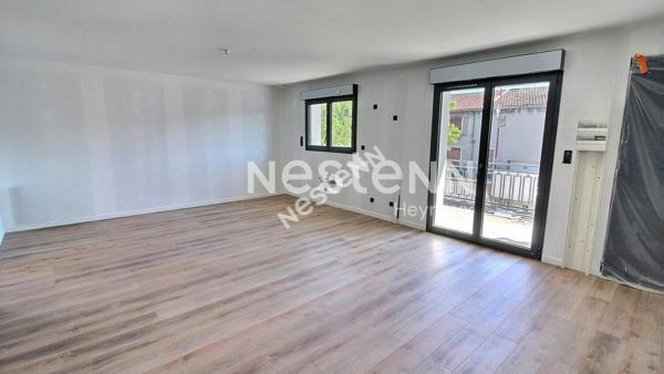 Centre village- Appartement 2 chambres- Balcon- Stationnement