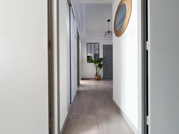Magnifique appartement T3 de 77 m2  avec garage, situé au second et dernier étage sans ascenseur d'une petite copropriété aux faibles charges