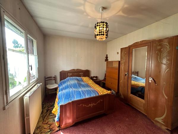 Maison à vendre 4 pièces LUSSAC LES EGLISES (87) sur grand jardin clos proche ruisseau.