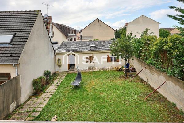 Maison 6 pièces 4 chambres de 123 m2 habitable avec une dépendance de 48 m2 Parcelles 485 m2 Jardin 350 m2