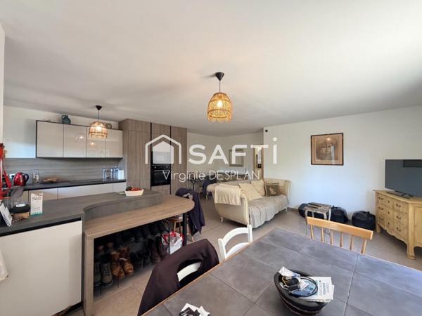 Appartement rez-de-jardin, 3 pièces avec terrasse, cave et place de parking privatives