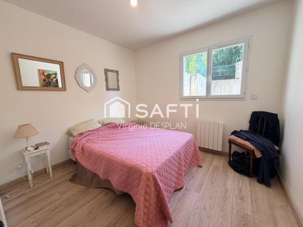 Appartement rez-de-jardin, 3 pièces avec terrasse, cave et place de parking privatives