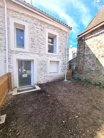 Maison de ville au DOUET