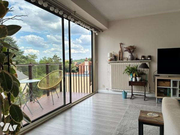 Appartement 2 pièces avec balcon, cave et ascenseur