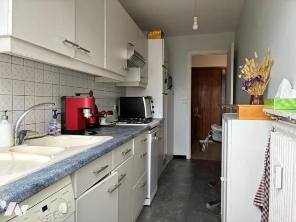 Appartement 2 pièces avec balcon, cave et ascenseur