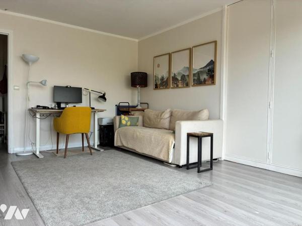 Appartement 2 pièces avec balcon, cave et ascenseur