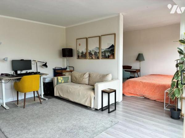 Appartement 2 pièces avec balcon, cave et ascenseur