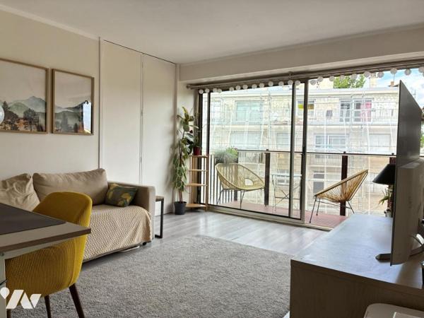 Appartement 2 pièces avec balcon, cave et ascenseur