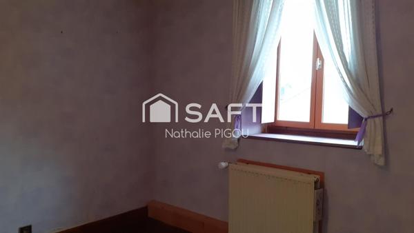 Grande maison familiale avec patio, garage double et atelier