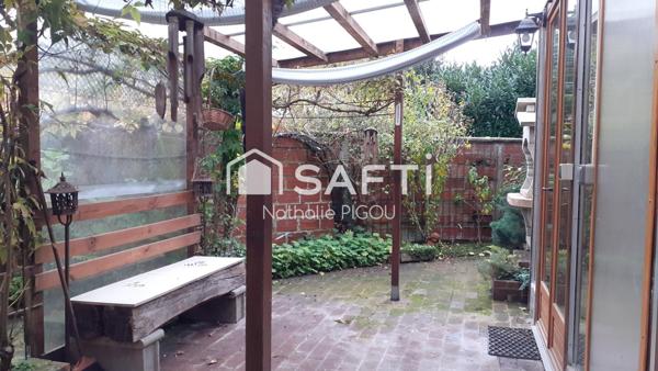 Grande maison familiale avec patio, garage double et atelier