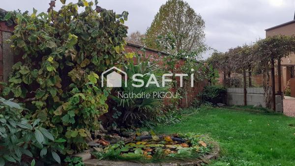 Grande maison familiale avec patio, garage double et atelier