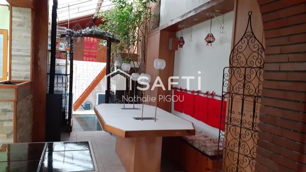 Grande maison familiale avec patio, garage double et atelier