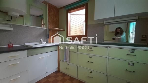 Grande maison familiale avec patio, garage double et atelier