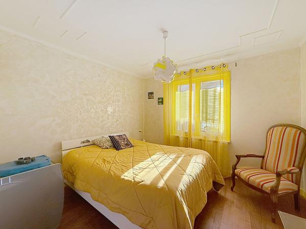 Belle maison à Meximieux de 140m² avec 5 chambres sur un jardin de 565m² avec terrasse couverte et garage