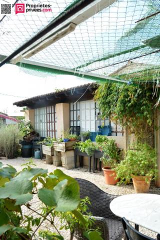 Maison de plain pied avec beau terrain