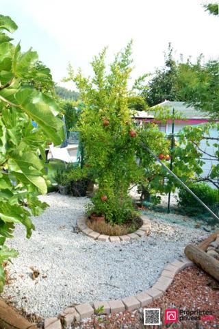 Maison de plain pied avec beau terrain