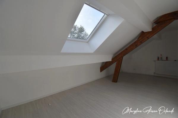 Exclusivité : un duplex d’exception – 140 m² habitables + Garage double + Jardin