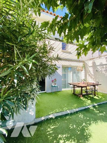 Maison de T4 avec jardin et place de stationnement privatives