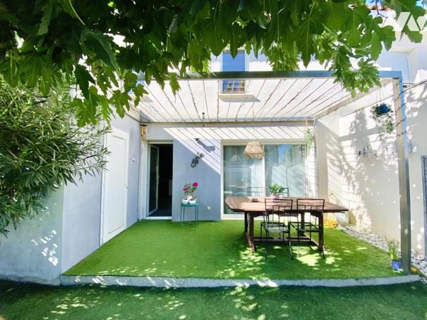 Maison de T4 avec jardin et place de stationnement privatives