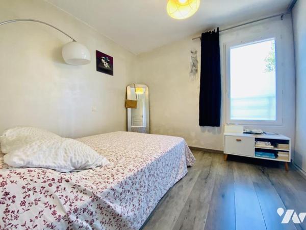 Maison de T4 avec jardin et place de stationnement privatives