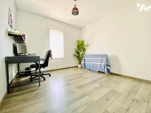 Maison de T4 avec jardin et place de stationnement privatives