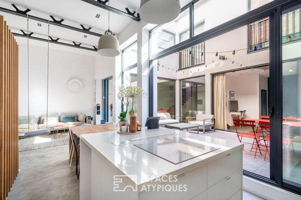 Loft avec patio dans une ancienne usine
