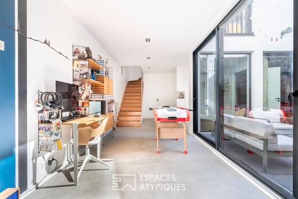 Loft avec patio dans une ancienne usine