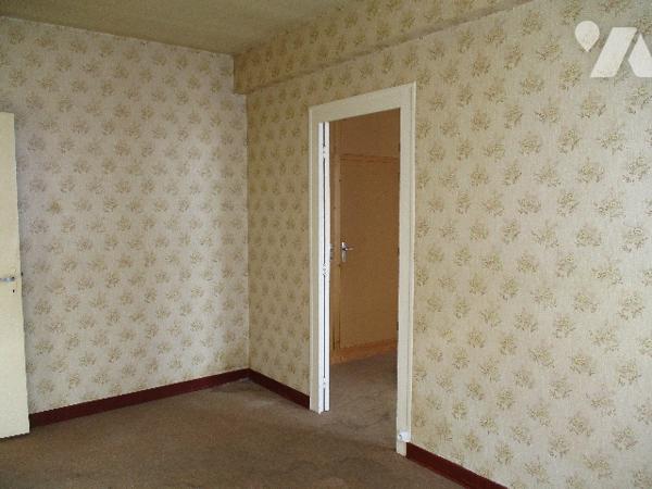 Maison proche centre-ville, 56m² hab., terrain 563m²,