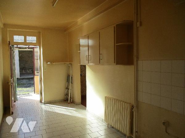 Maison proche centre-ville, 56m² hab., terrain 563m²,