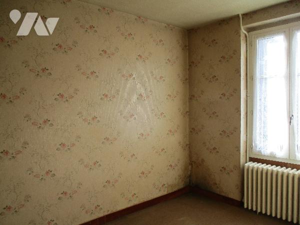 Maison proche centre-ville, 56m² hab., terrain 563m²,