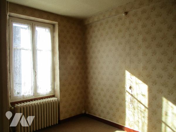 Maison proche centre-ville, 56m² hab., terrain 563m²,