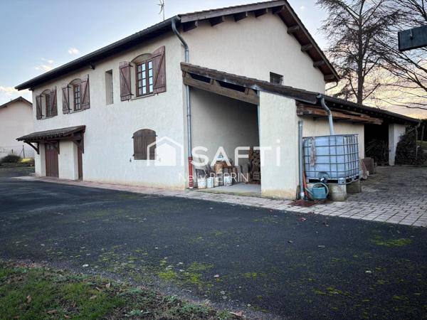 Jolie maison des années 80 sur un terrain arboré de 1602 m2 située sur la commune de Gorrevod