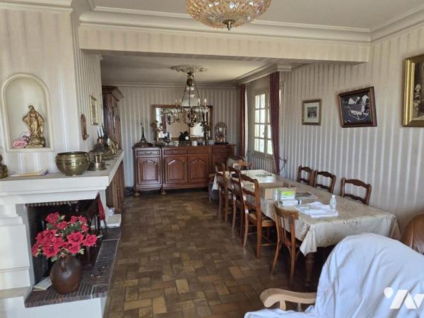 Maison 5 chambres, 130m² habitables, proche centre-ville.