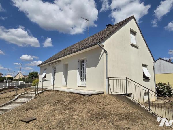 Maison 5 chambres, 130m² habitables, proche centre-ville.