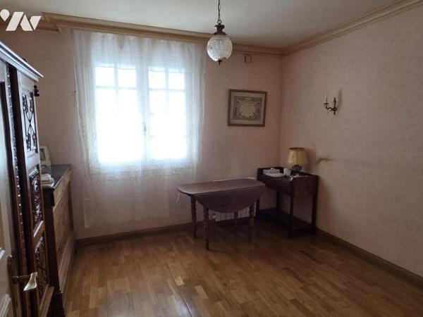 Maison 5 chambres, 130m² habitables, proche centre-ville.