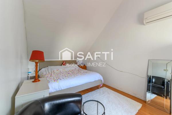 Maison d'environ 125 m 2 avec 5 chambres dont un en Rdc