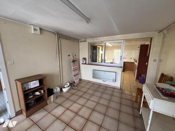Maison d'habitation mitoyenne