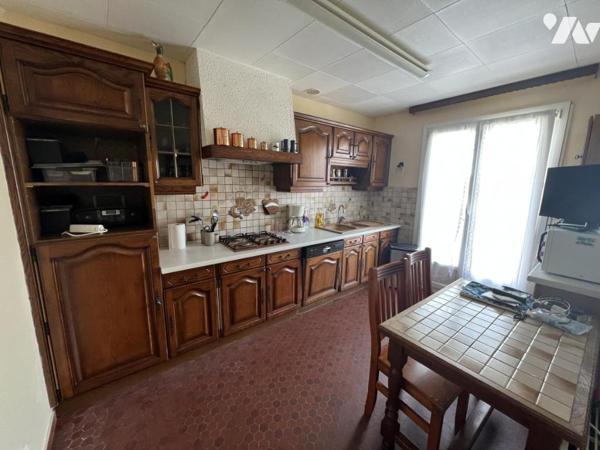 Maison d'habitation mitoyenne