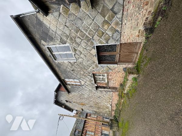 Une maison à usage d'habitation à rénover située au SAP EN AUGE rue du Commerce (142m²)