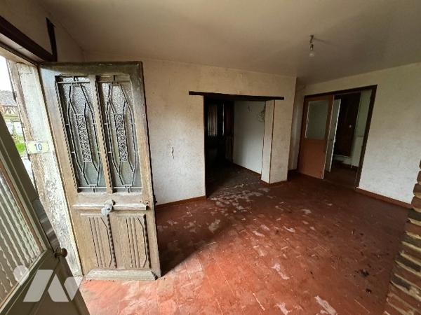 Une maison à usage d'habitation à rénover située au SAP EN AUGE rue du Commerce (142m²)