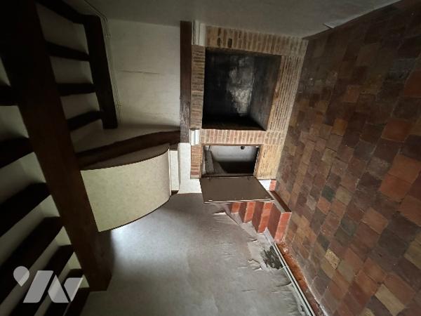 Une maison à usage d'habitation à rénover située au SAP EN AUGE rue du Commerce (142m²)