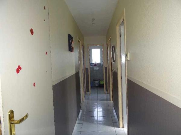 SECTEUR AMBAZAC VASTE MAISON DE 122 M² SUR SOUS-SOL SEMI ENTERRE 4 CHAMBRES SUR UN TERRAIN DE 2500 M²