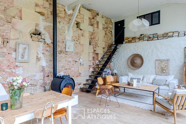 Ancienne dépendance d’un Château du XVIIe siècle : une rénovation inspirée entre pierres anciennes et ateliers de création