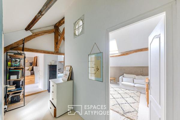 Ancienne dépendance d’un Château du XVIIe siècle : une rénovation inspirée entre pierres anciennes et ateliers de création