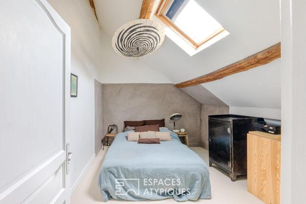 Ancienne dépendance d’un Château du XVIIe siècle : une rénovation inspirée entre pierres anciennes et ateliers de création