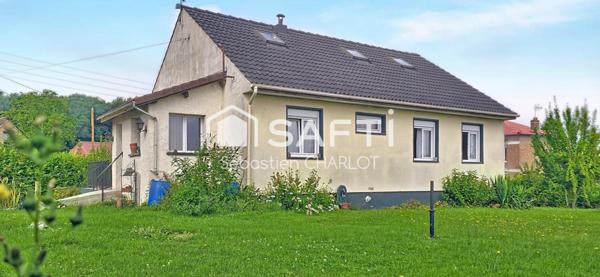 Grande maison avec sous-sol complet et jardin